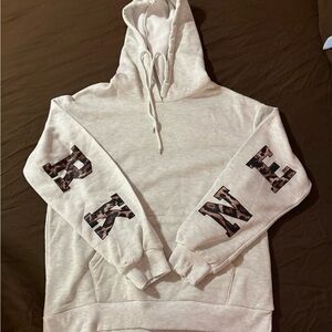 Cream Hoodie with Patterned Sleeves